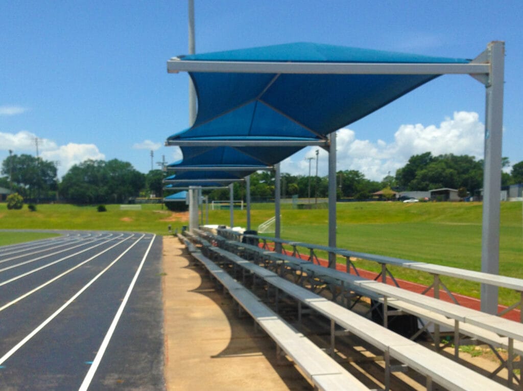 image of shades erected over bleachers area next to running track